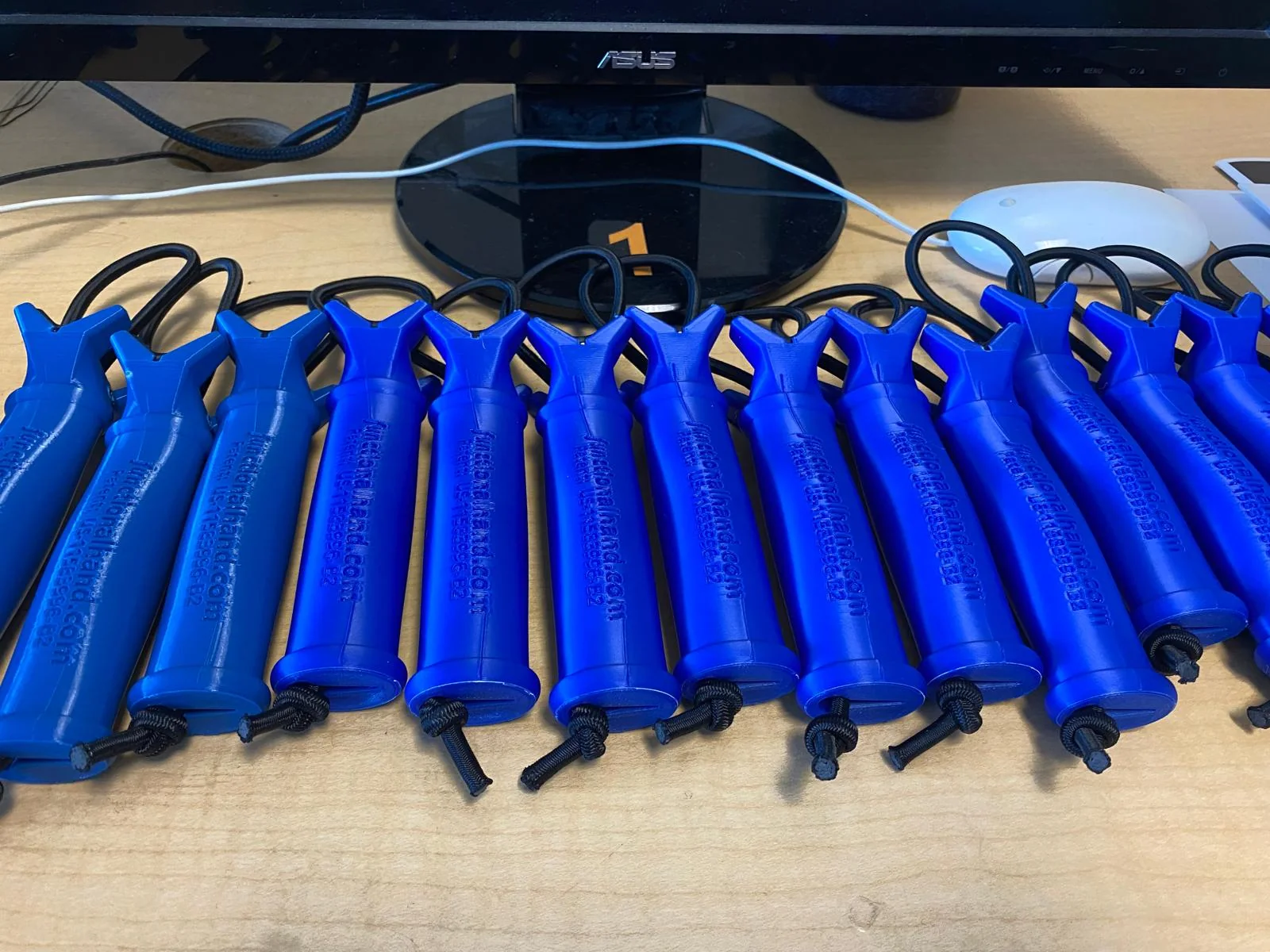 Assembled Functional Hand grips on the Illinois MakerLab worktable